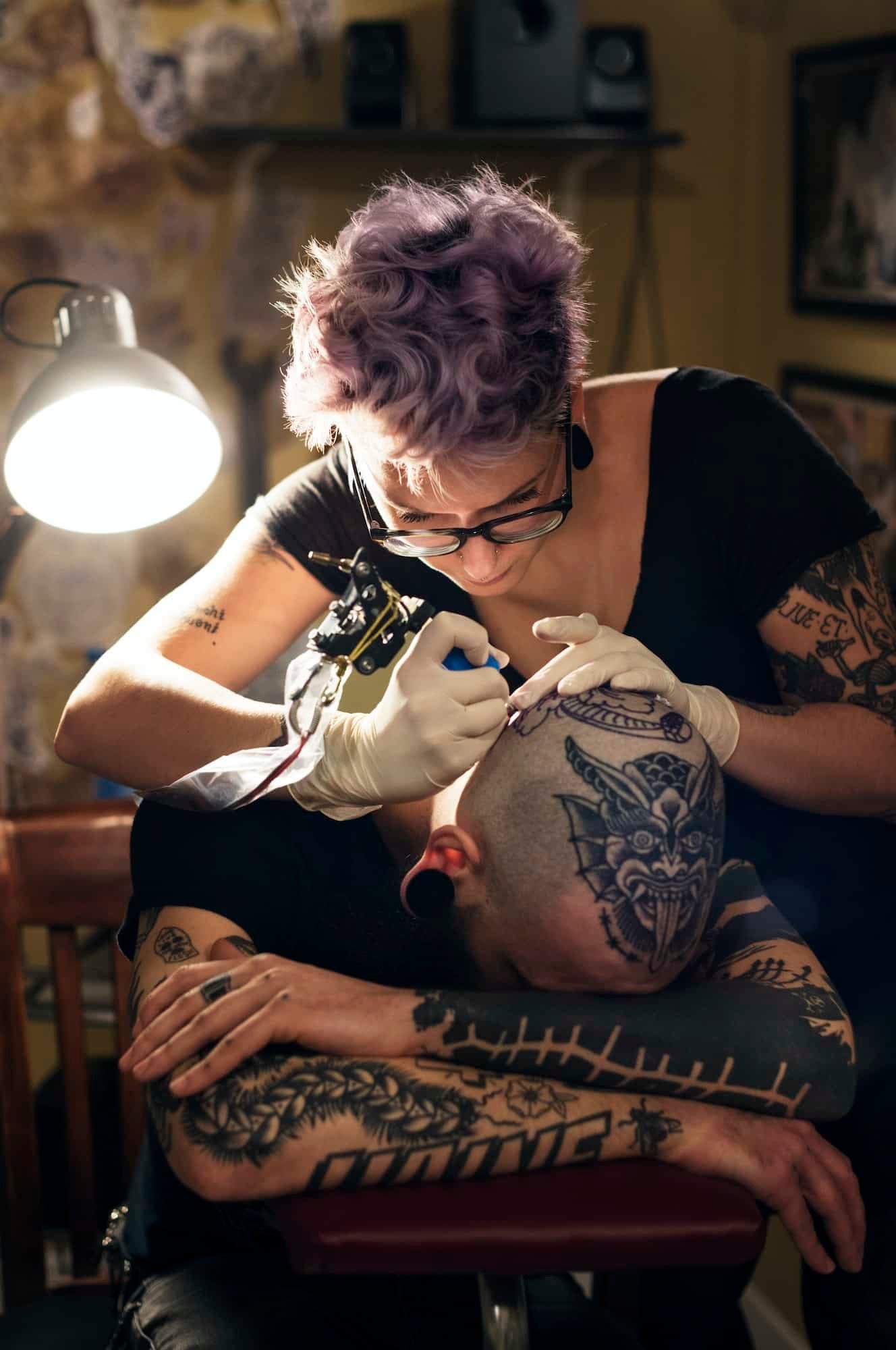 Female Tattoo Artist Tattooing Male Client In Studio, Hand Tattoo Designs For Men, small tattoo