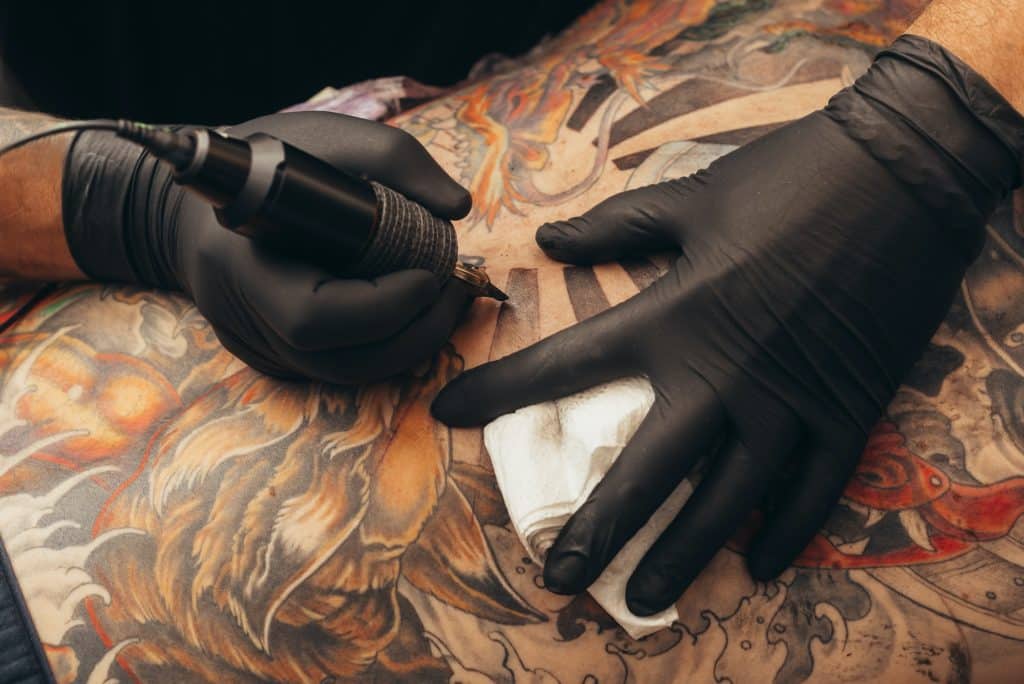 Close up of the tattoo machine. Tattooing.