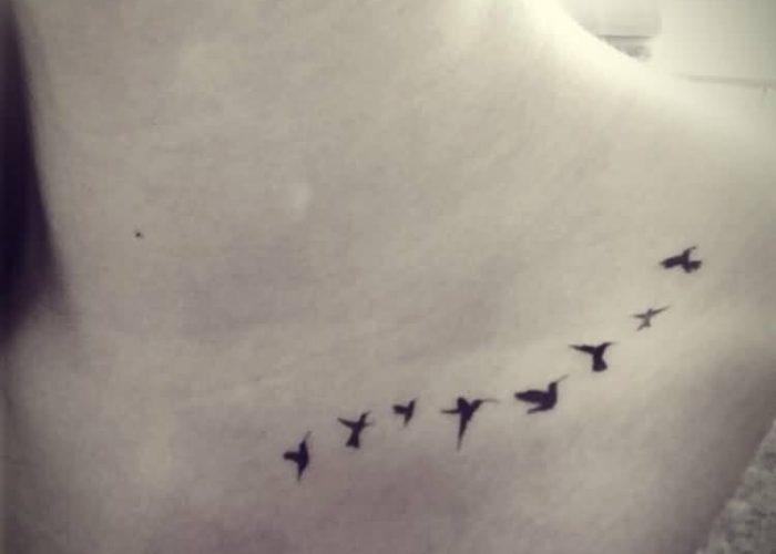 Flock-Of-Birds-Tattoo-On-Collar-Bone