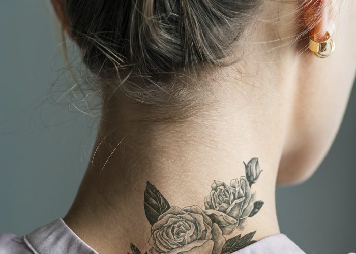 Back neck tattoo of a woman