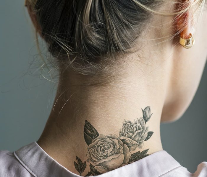 Back neck tattoo of a woman
