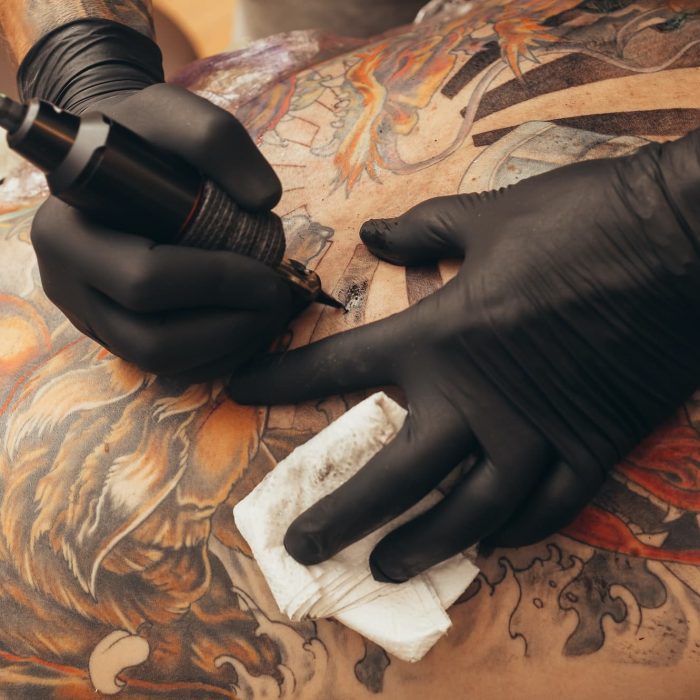 Close up of the tattoo machine. Tattooing.