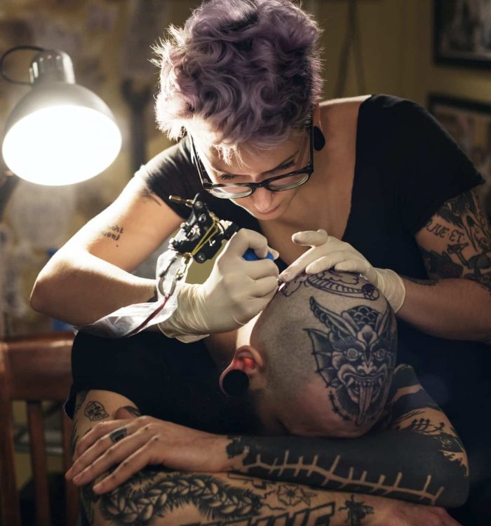 Female Tattoo Artist Tattooing Male Client In Studio, Hand Tattoo Designs For Men, small tattoo