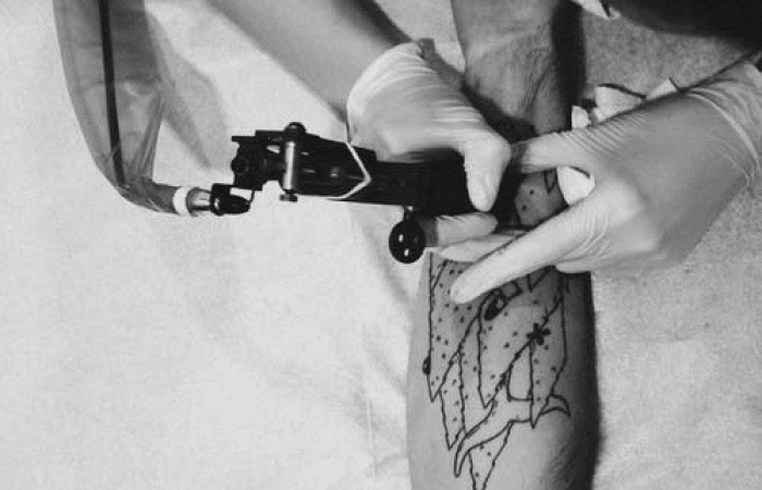 Customer Getting Tattoo on Arm