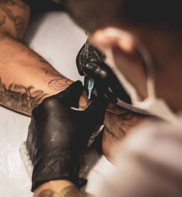 Tattoo Artist Making Koi Fish Tattoo, small tattoo for dad