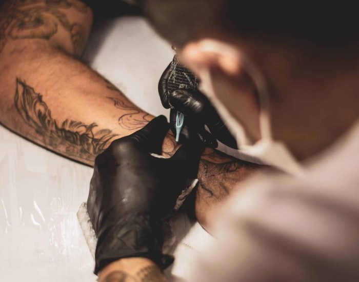 Tattoo Artist Making Koi Fish Tattoo