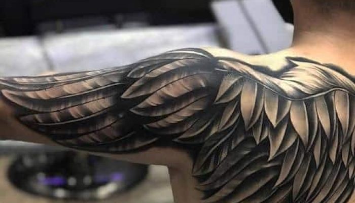 shoulder blackgrey wings tattoo