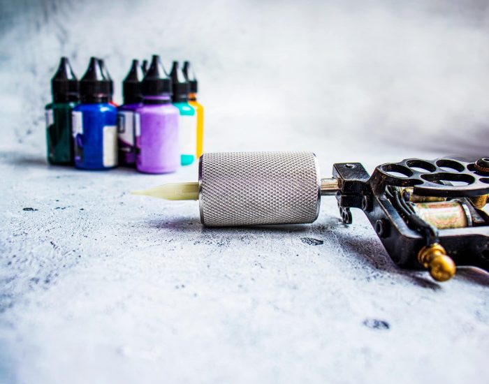 tattoo machine, Close-up ,color tattoo concept, preparation for tattooing, tattoo parlor.