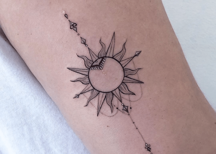 Sun and Moon Tattoo on arm